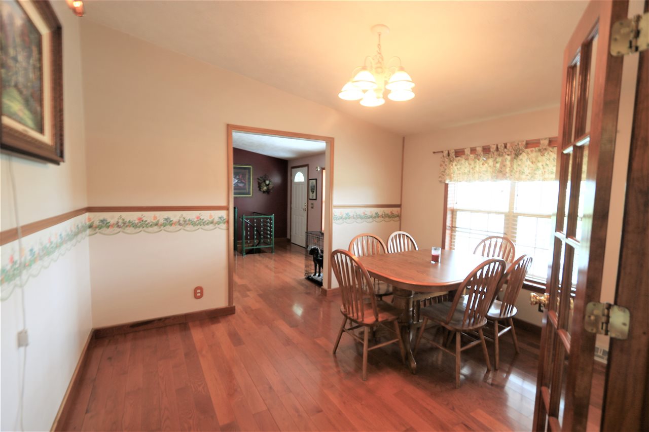 954 Quick's Mill Road Staunton, VA 24401 - Photo 32 of 45 a view of a dining room with furniture and chandelier