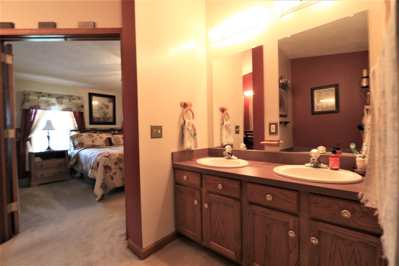 954 Quick's Mill Road Staunton, VA 24401 - Photo 39 of 45 a en suite bathroom with double vanity sinks and a mirror