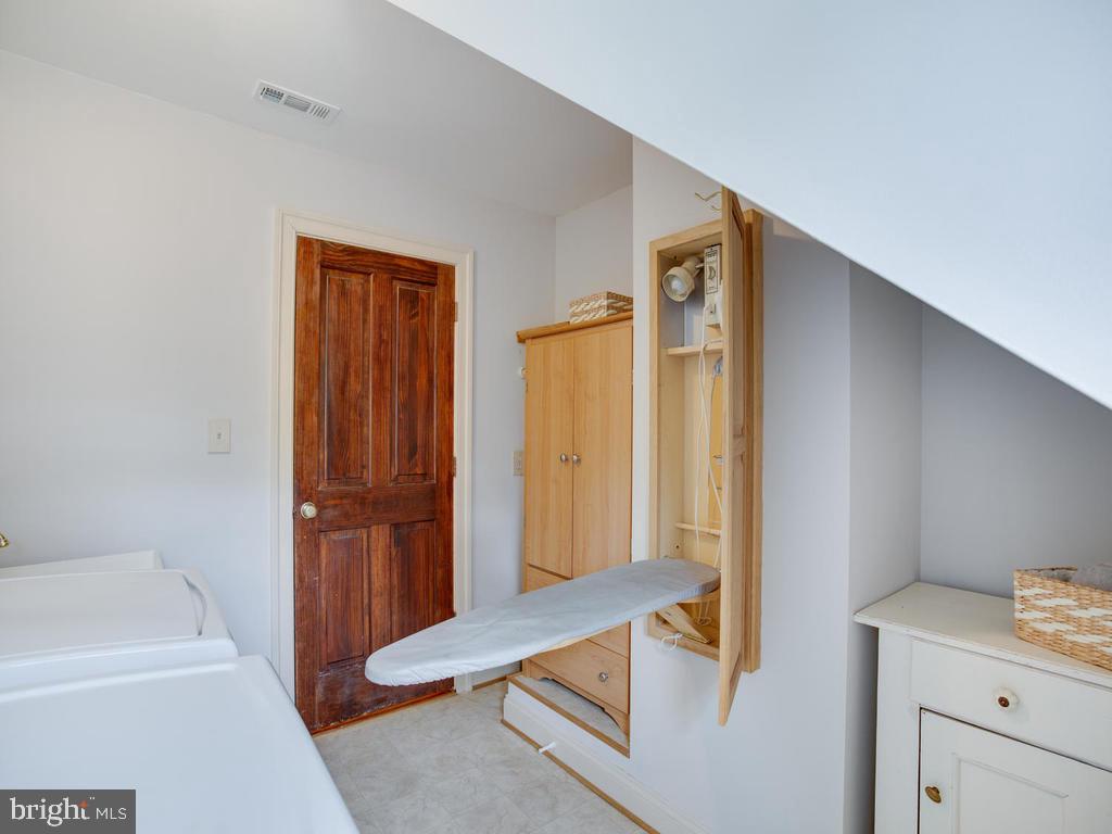 3155 Jones Road Dunkirk, MD 20754 - Photo 43 of 89 Built ins and iron board in laundry room
