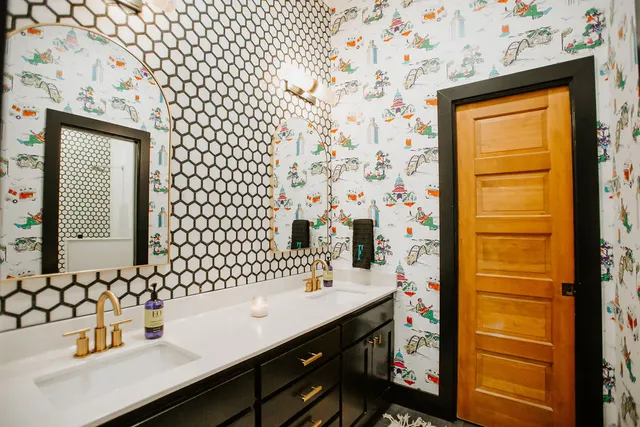 a bathroom with a sink and a mirror