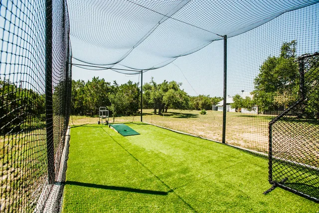 a view of swimming pool with a patio