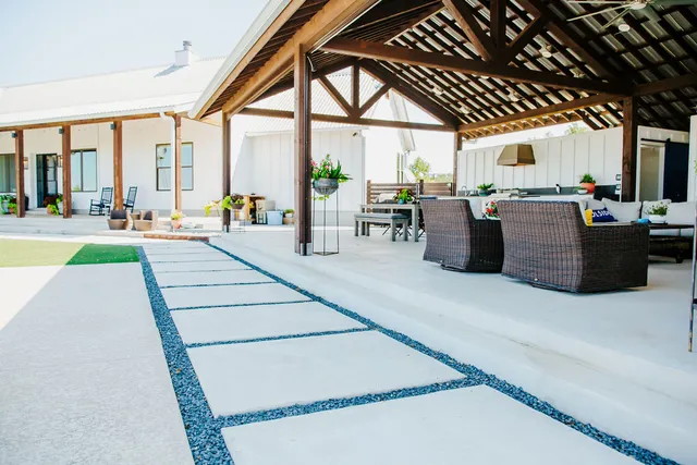 a living room with large windows