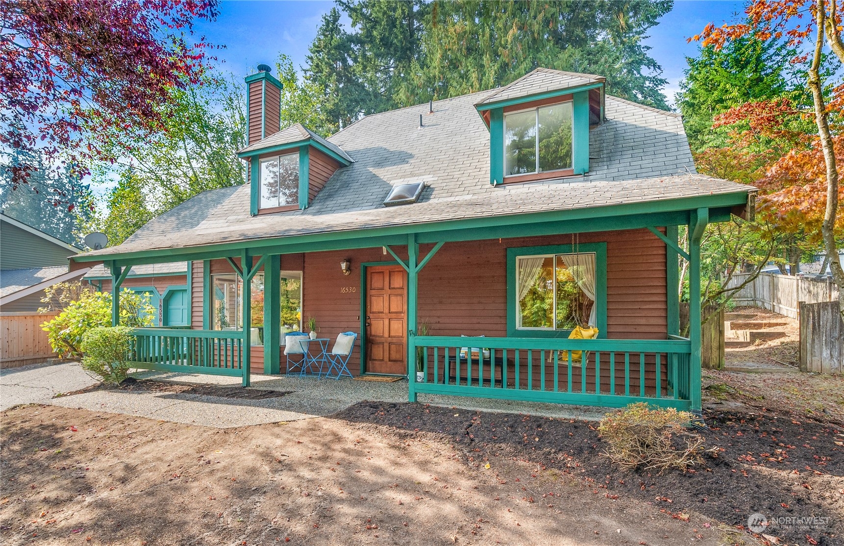 16530 3rd Drive Southeast Bothell, WA 98012 - Photo 1 of 40 a front view of a house with garden