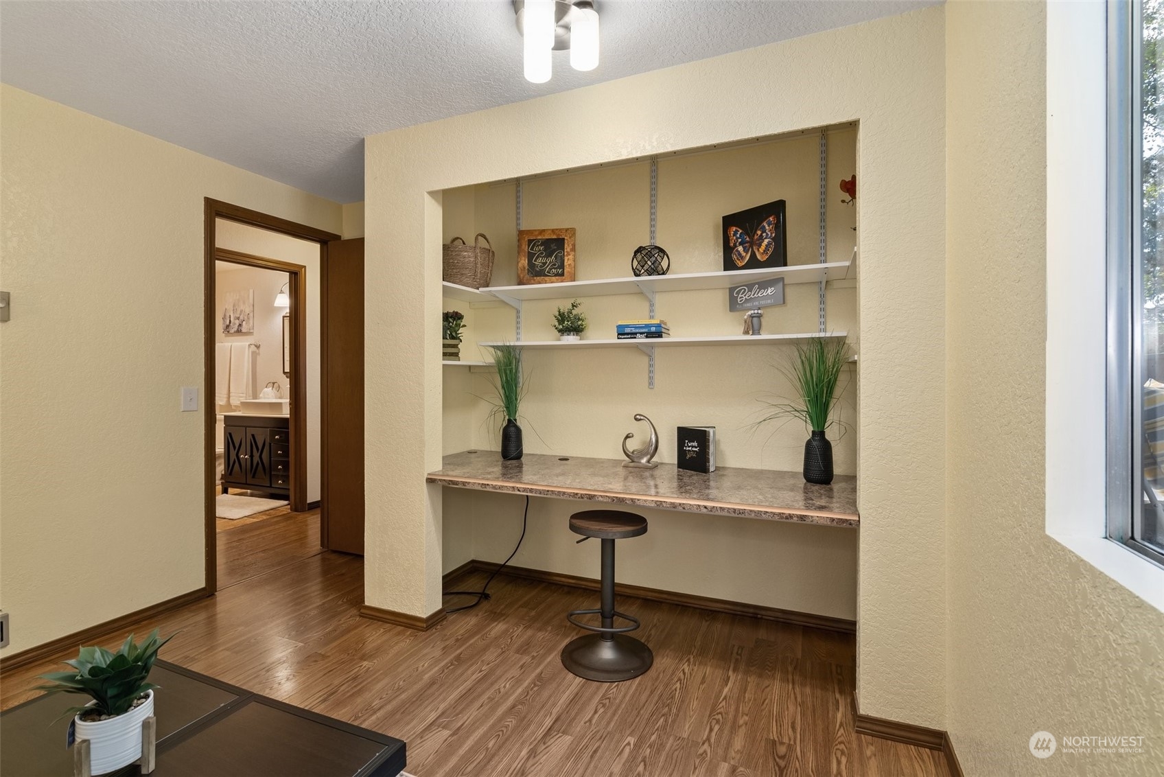 16530 3rd Drive Southeast Bothell, WA 98012 - Photo 20 of 40 a view of a workspace with furniture and wooden floor