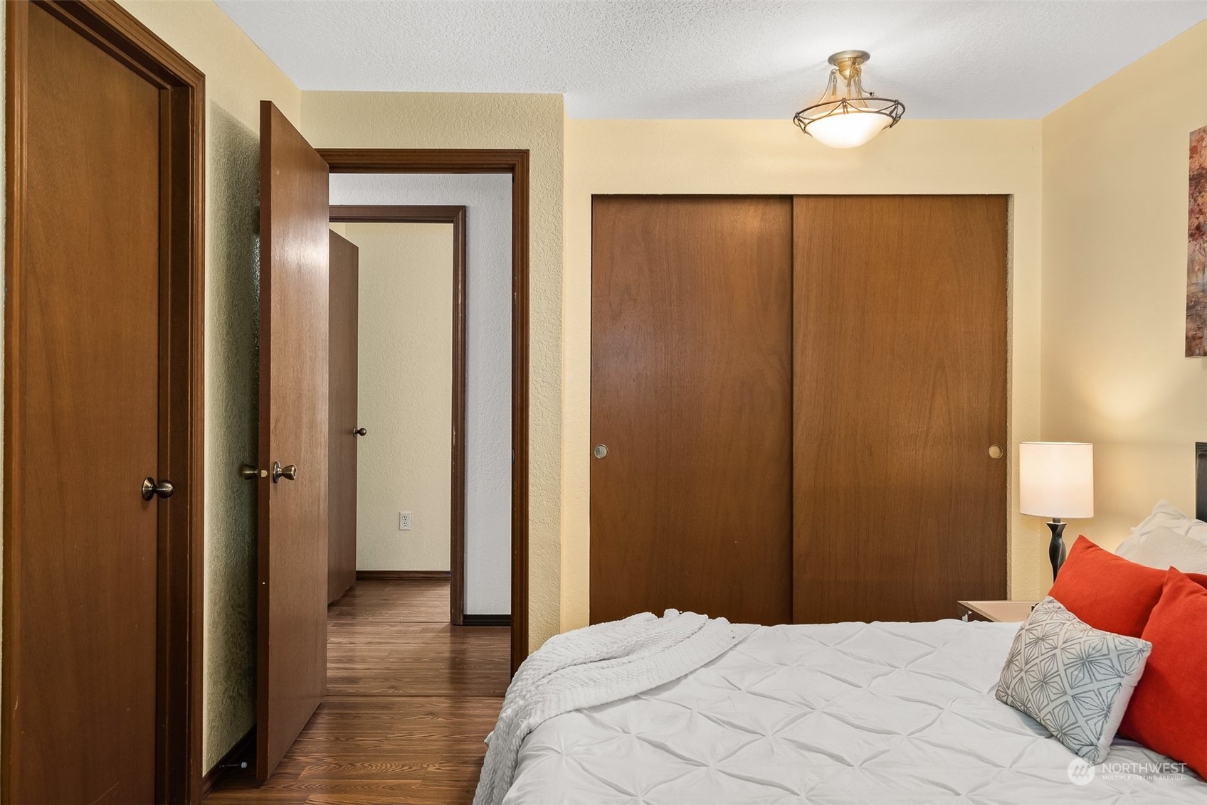 16530 3rd Drive Southeast Bothell, WA 98012 - Photo 23 of 40 a bedroom with a bed and a mirror