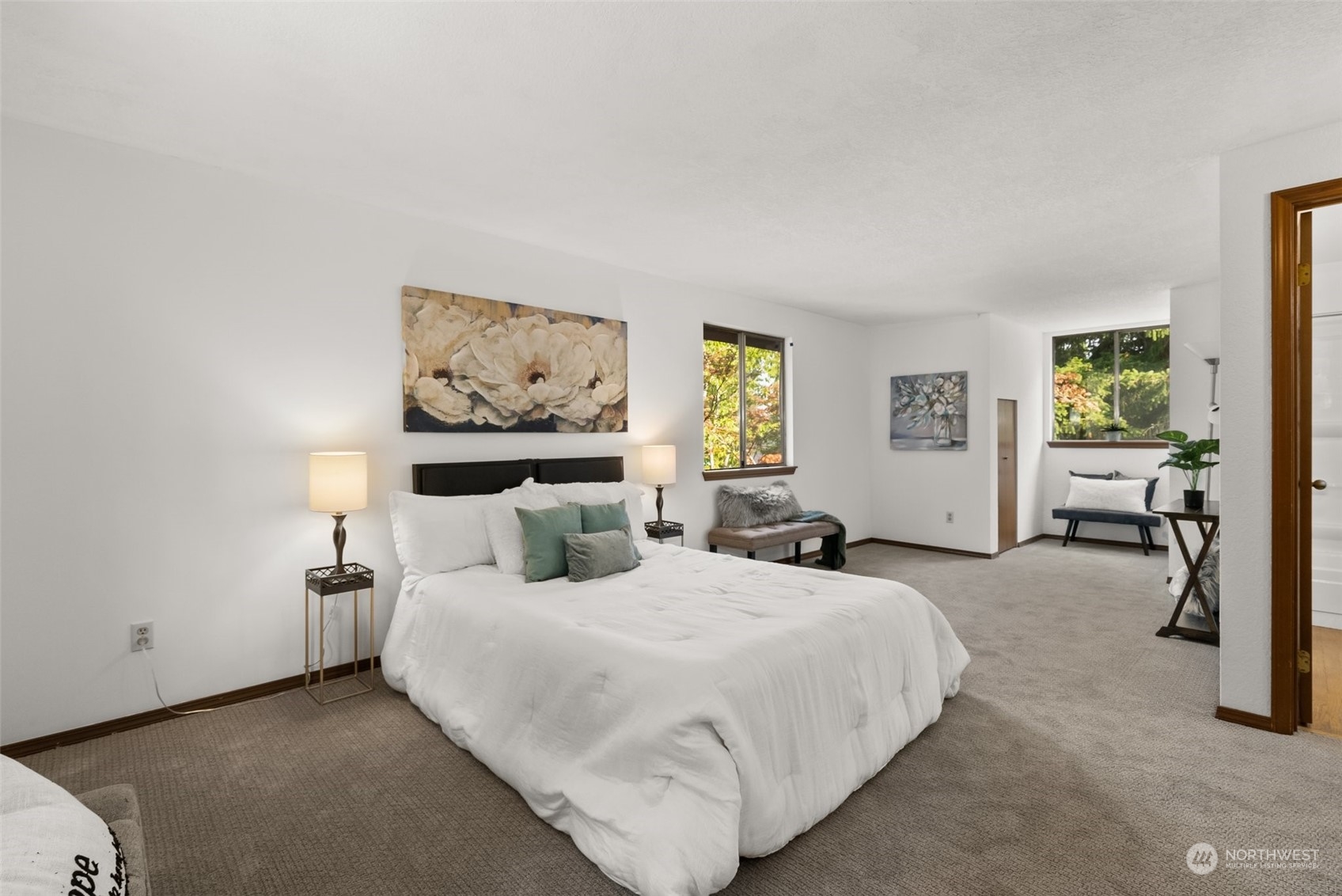 16530 3rd Drive Southeast Bothell, WA 98012 - Photo 25 of 40 a bedroom with a bed and a painting on the wall