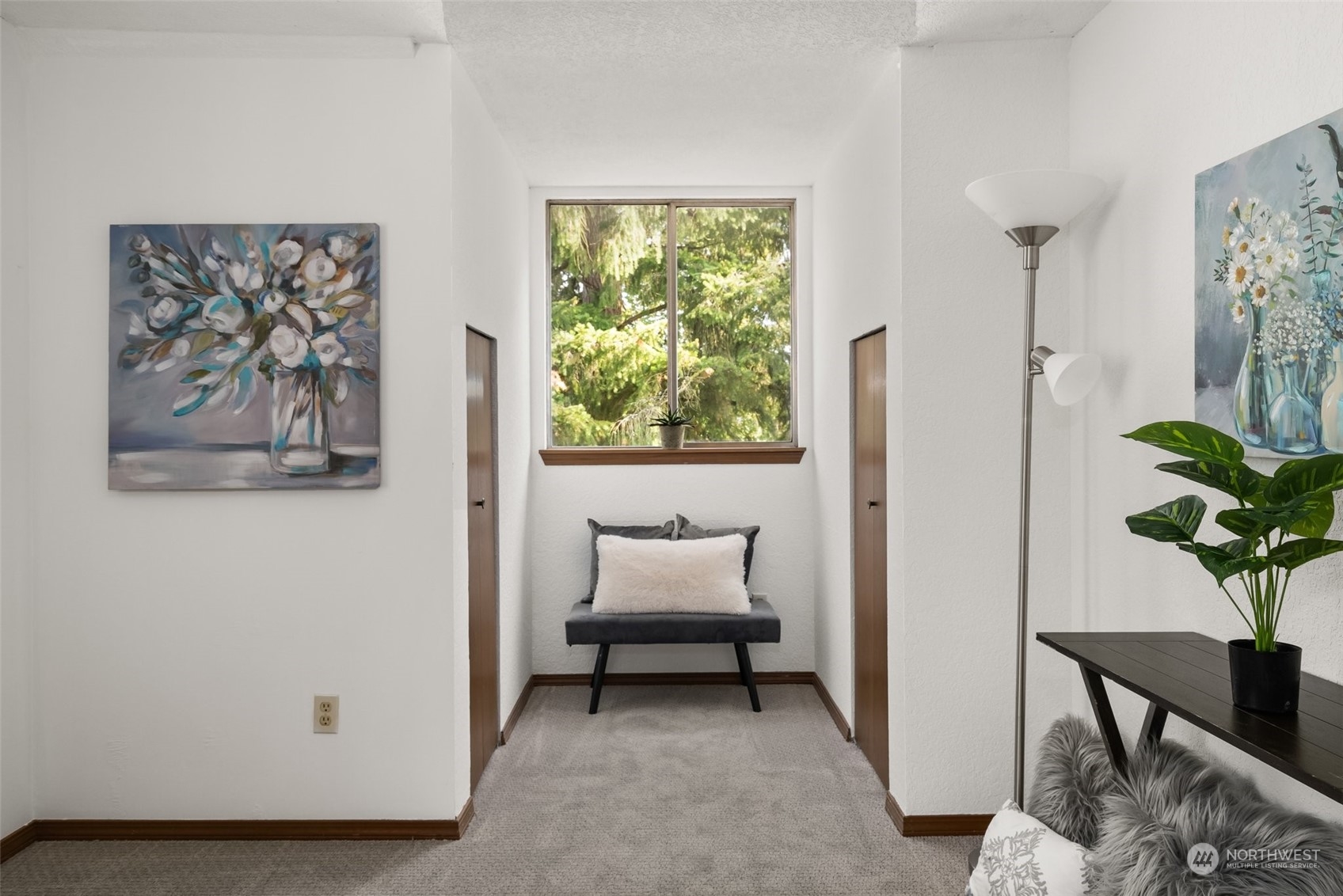 16530 3rd Drive Southeast Bothell, WA 98012 - Photo 26 of 40 a hallway with painting and a potted plant