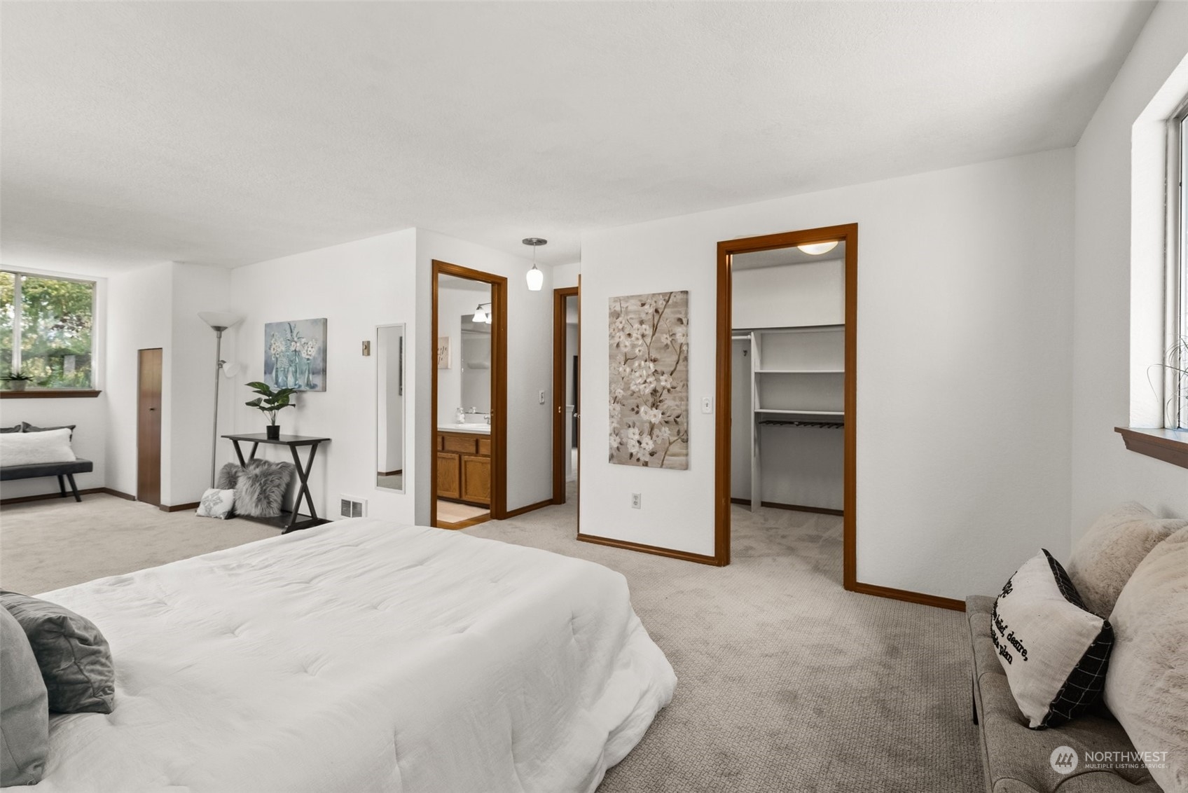 16530 3rd Drive Southeast Bothell, WA 98012 - Photo 28 of 40 a bedroom with a bed and a large mirror