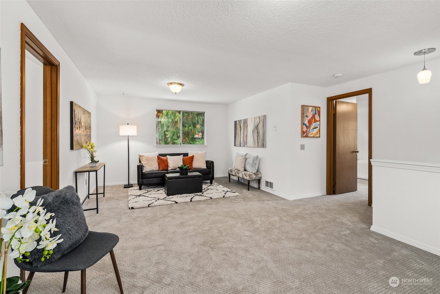 16530 3rd Drive Southeast Bothell, WA 98012 - Photo 31 of 40 a living room with furniture and a flat screen tv