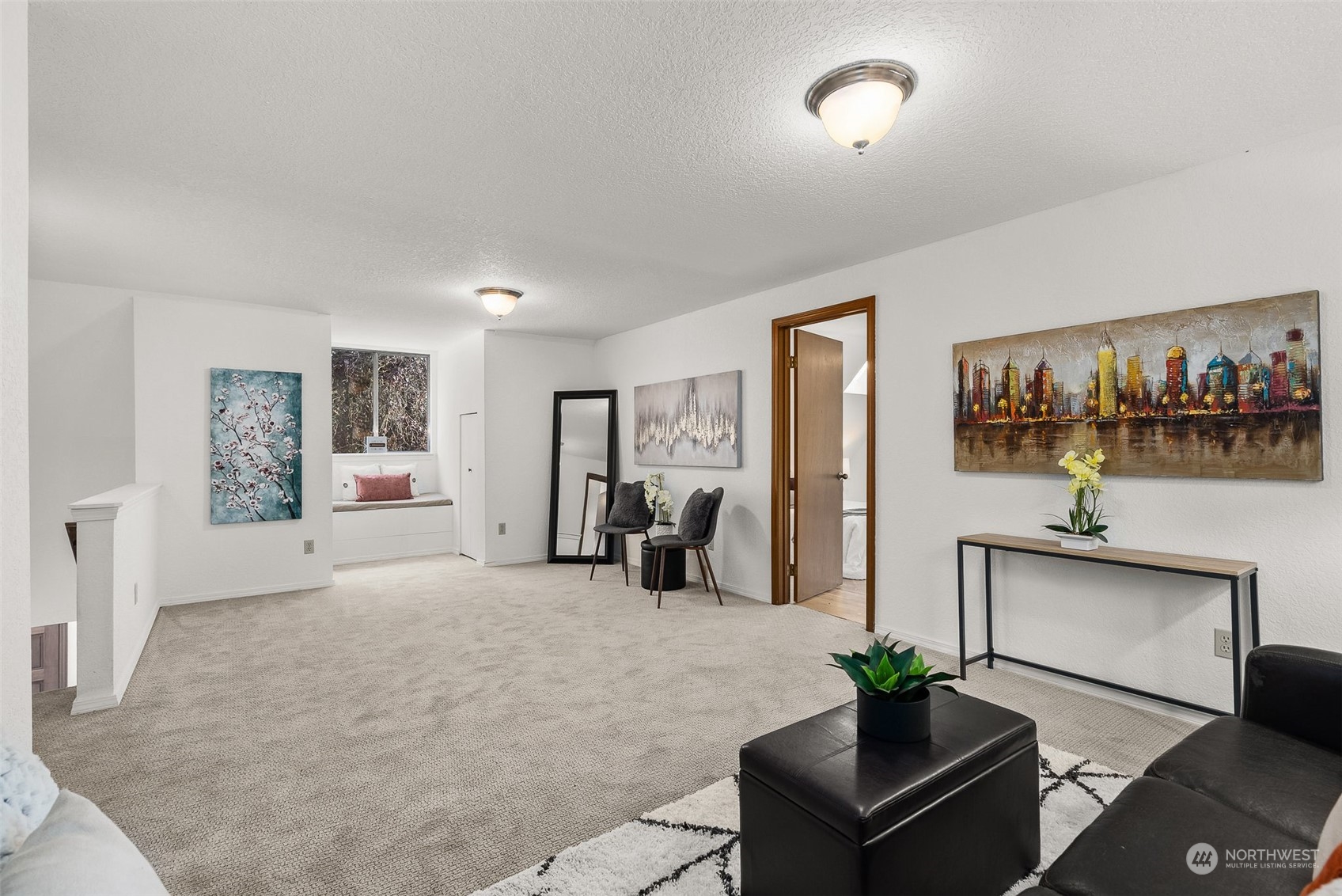 16530 3rd Drive Southeast Bothell, WA 98012 - Photo 34 of 40 a living room with furniture a chandelier and a flat screen tv