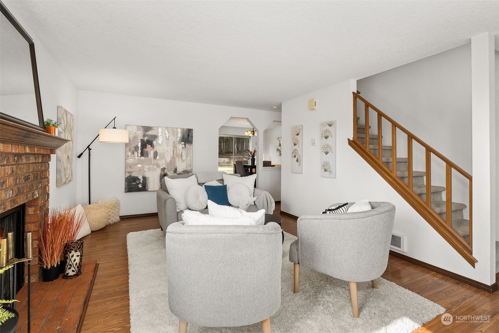 16530 3rd Drive Southeast Bothell, WA 98012 - Photo 9 of 40 a living room with furniture and a fireplace