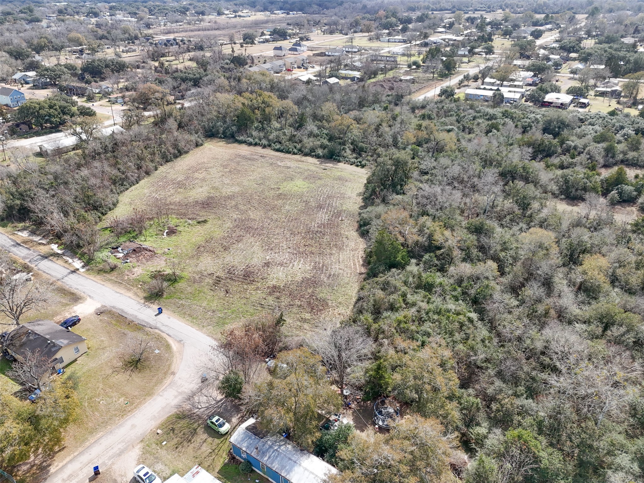 Tbd Tbd 22nd Hempstead, TX 77445 - Photo 10 of 20 This view shows proximity to existing homes and paved road access.