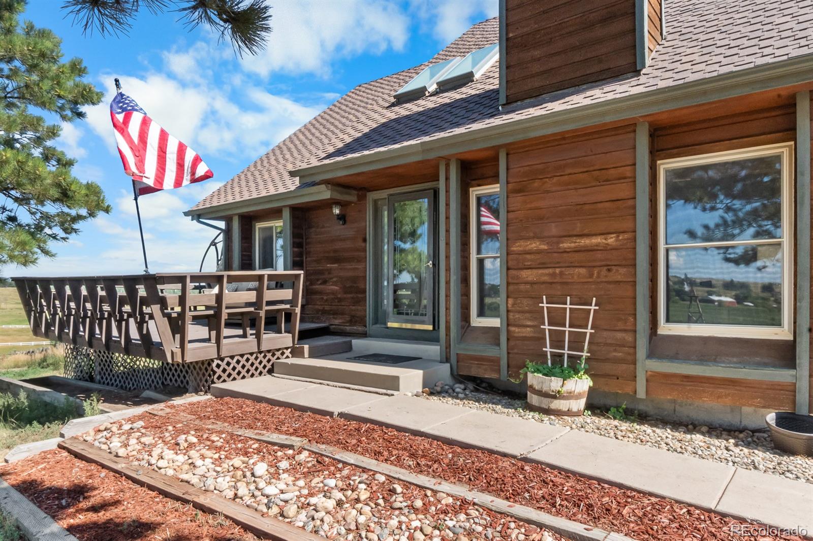 3163 Windstream Lane Elizabeth, CO 80107 - Photo 4 of 48 a front view of a house with a garage