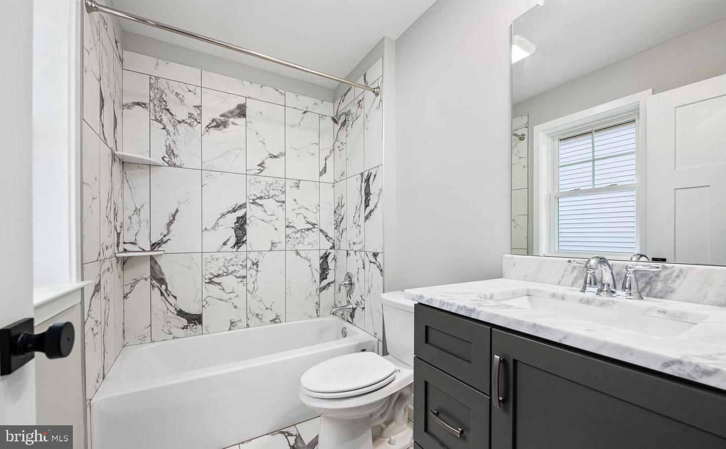 2 Cynwyd Broomall, PA 19008 - Photo 9 of 10 a bathroom with a sink a toilet and a bathtub