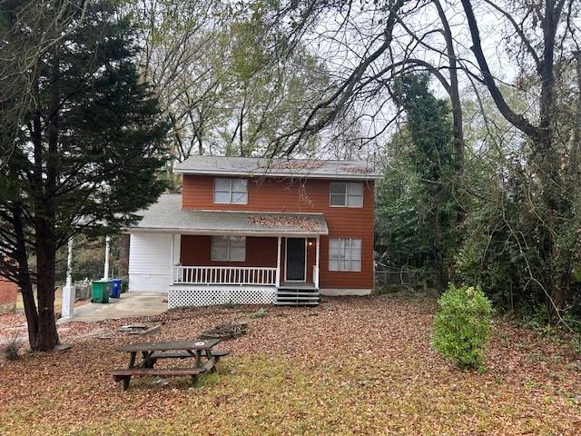 1833 Terry Mill Road Southeast Atlanta, GA 30316 - Photo 2 of 22 a house with trees in front of it