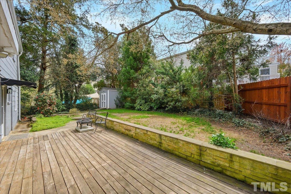 3225 Merriman Avenue Raleigh, NC 27607 - Photo 17 of 19 a view of a backyard with sitting area