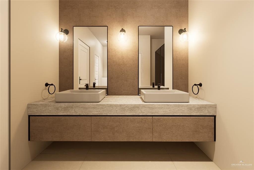 3009 Santa Maria Street, Unit A Weslaco, TX 78596 - Photo 11 of 15 a bathroom with a sink and a mirror