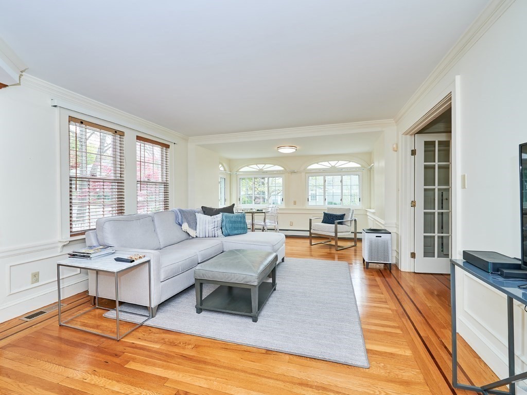 205 Bonad Road Brookline, MA 02467 - Photo 8 of 17 a living room with furniture and a wooden floor