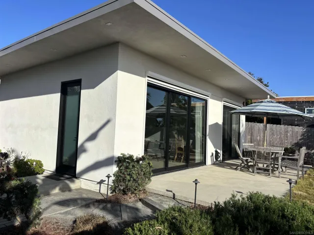 a view of a building with sitting area