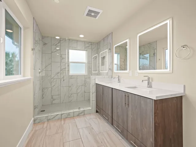 a white bath tub sitting in a bathroom