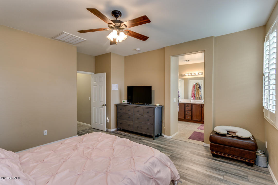2226 East Gillcrest Road Gilbert, AZ 85298 - Photo 20 of 49 a bedroom with furniture and a flat screen tv