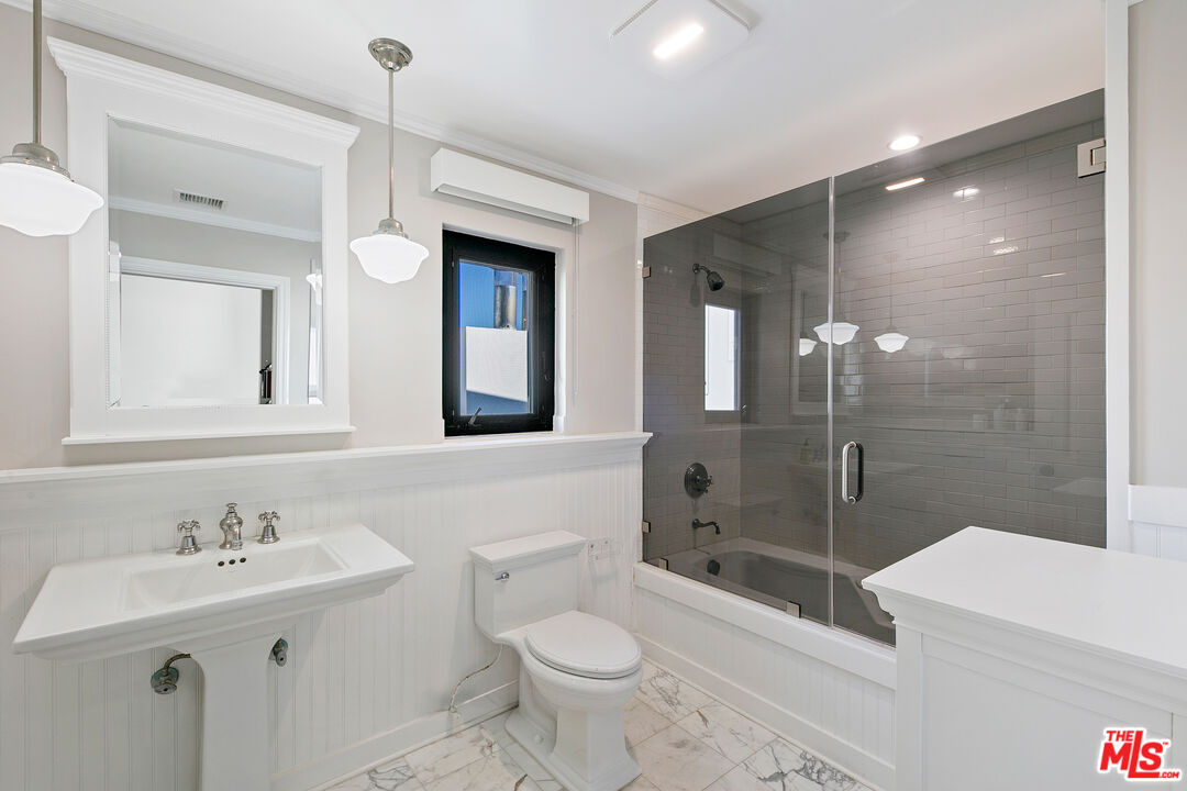 25216 Malibu Road Malibu, CA 90265 - Photo 15 of 21 a bathroom with a sink a toilet and shower