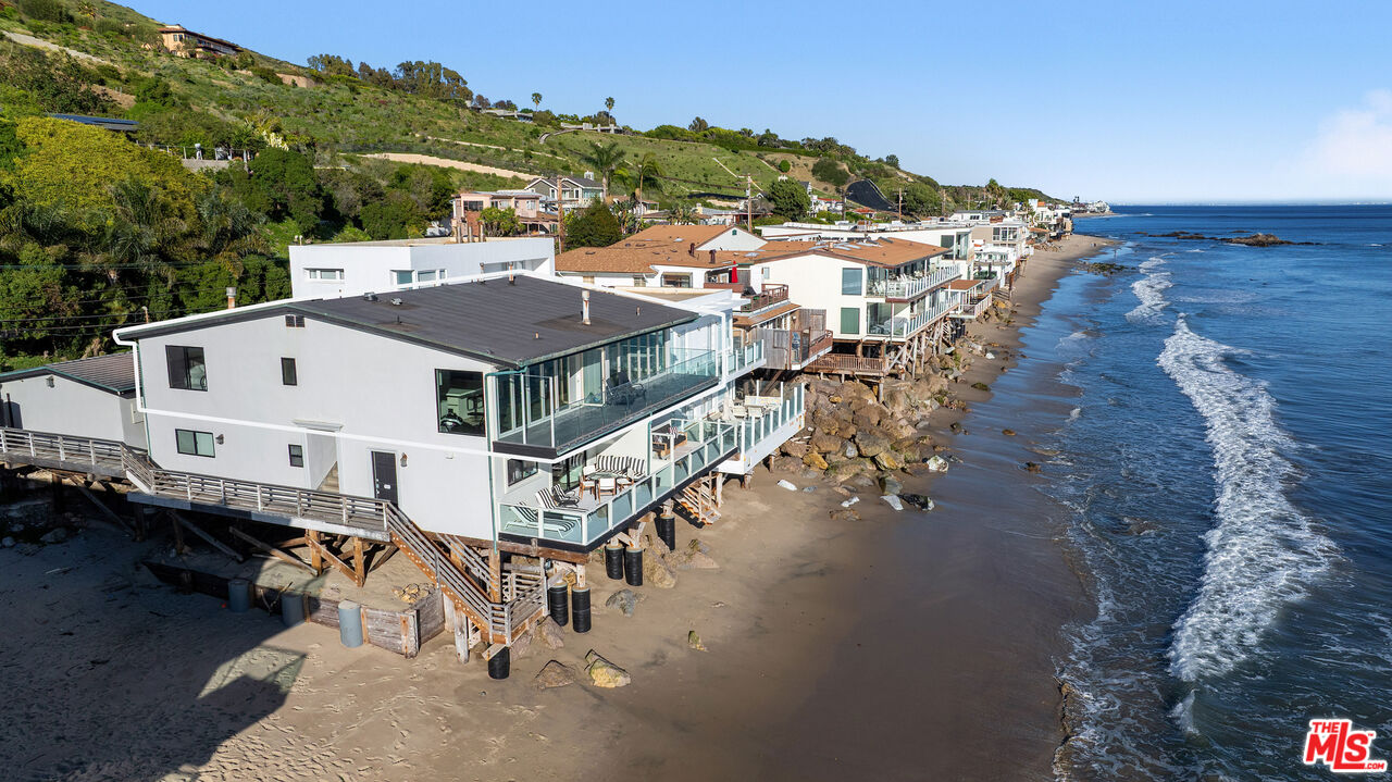 25216 Malibu Road Malibu, CA 90265 - Photo 19 of 21 a view of a house with a yard