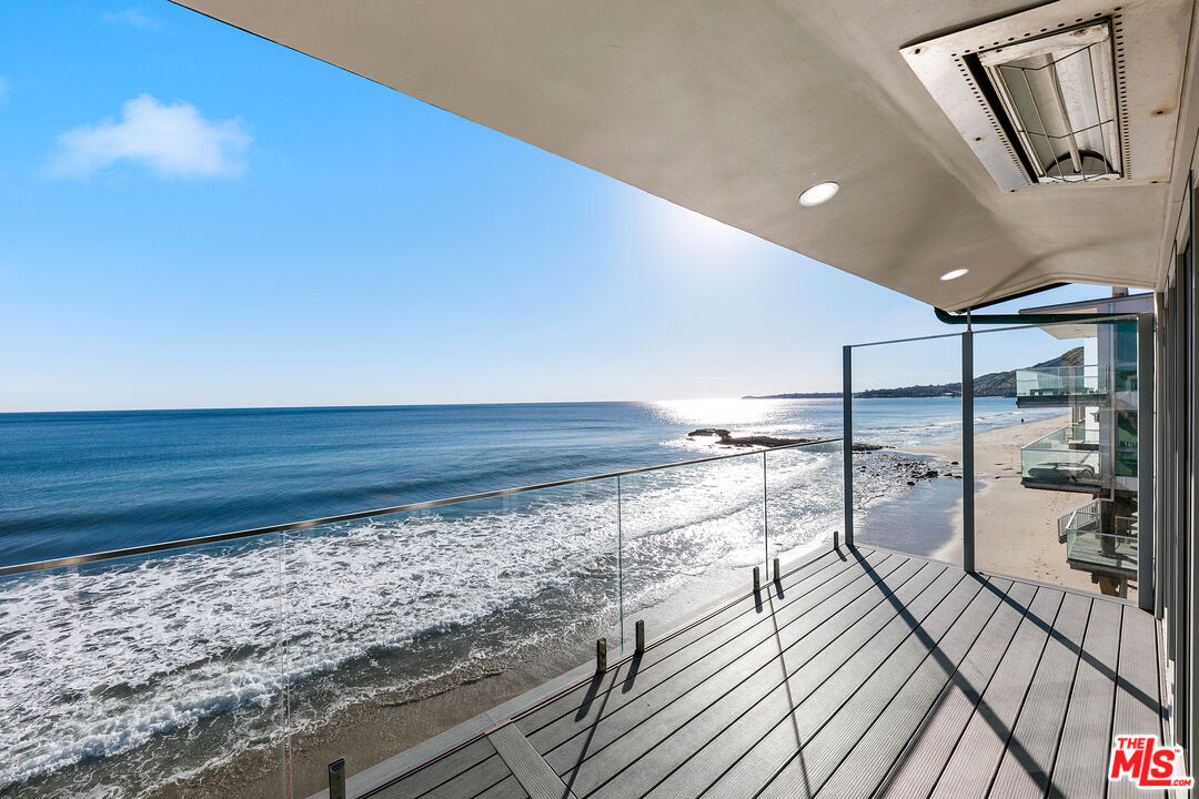 25216 Malibu Road Malibu, CA 90265 - Photo 9 of 21 a view of a living room and a balcony