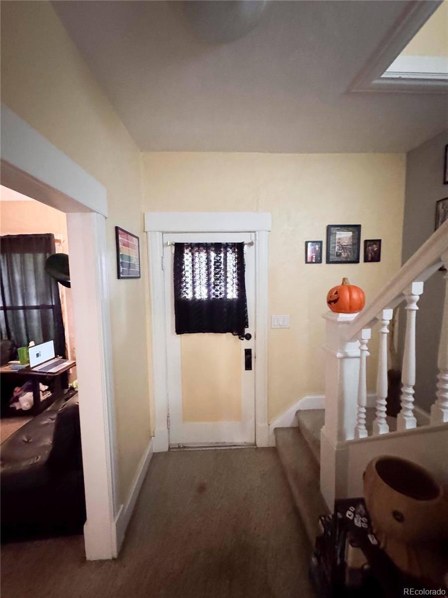 910 South Main Street Lamar, CO 81052 - Photo 13 of 18 a living room with furniture and a window