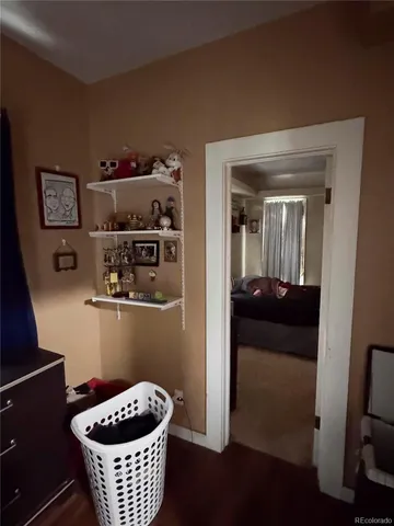 a kitchen with a refrigerator and a sink