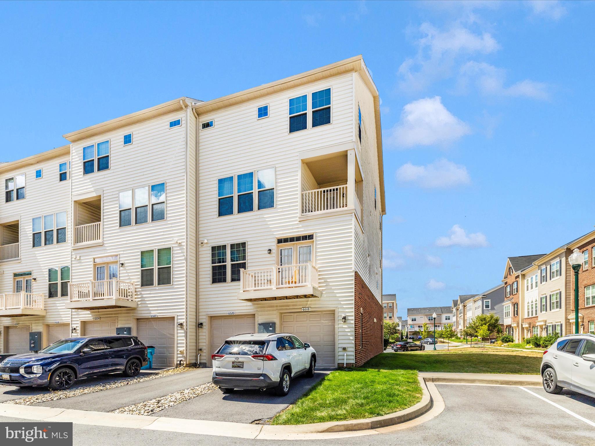 6020 Forum Square Frederick, MD 21703 - Photo 39 of 54 a city view with tall buildings and cars parked in front of it