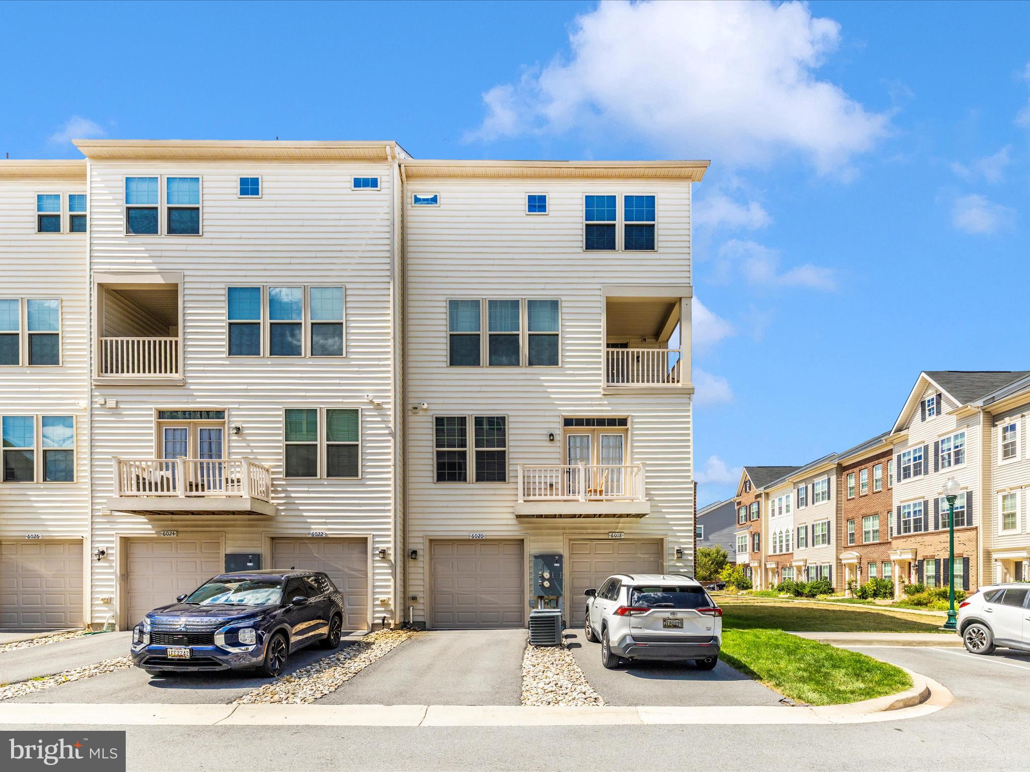 6020 Forum Square Frederick, MD 21703 - Photo 40 of 54 a car parked in front of a building