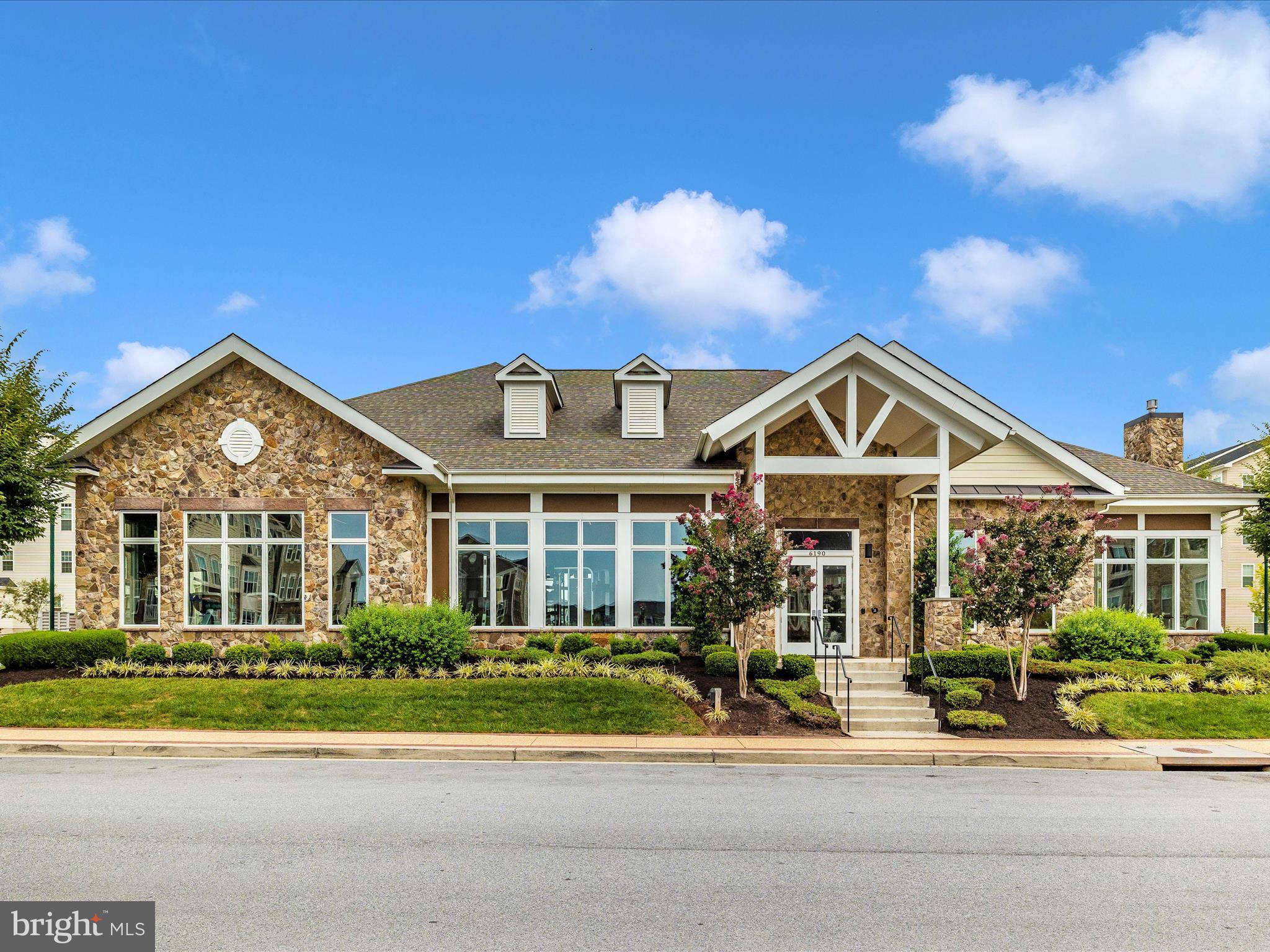 6020 Forum Square Frederick, MD 21703 - Photo 43 of 54 front view of a house with a yard