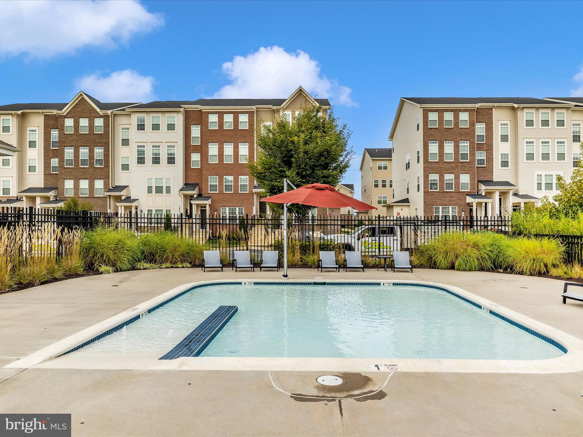 6020 Forum Square Frederick, MD 21703 - Photo 45 of 54 a view of a building with a swimming pool