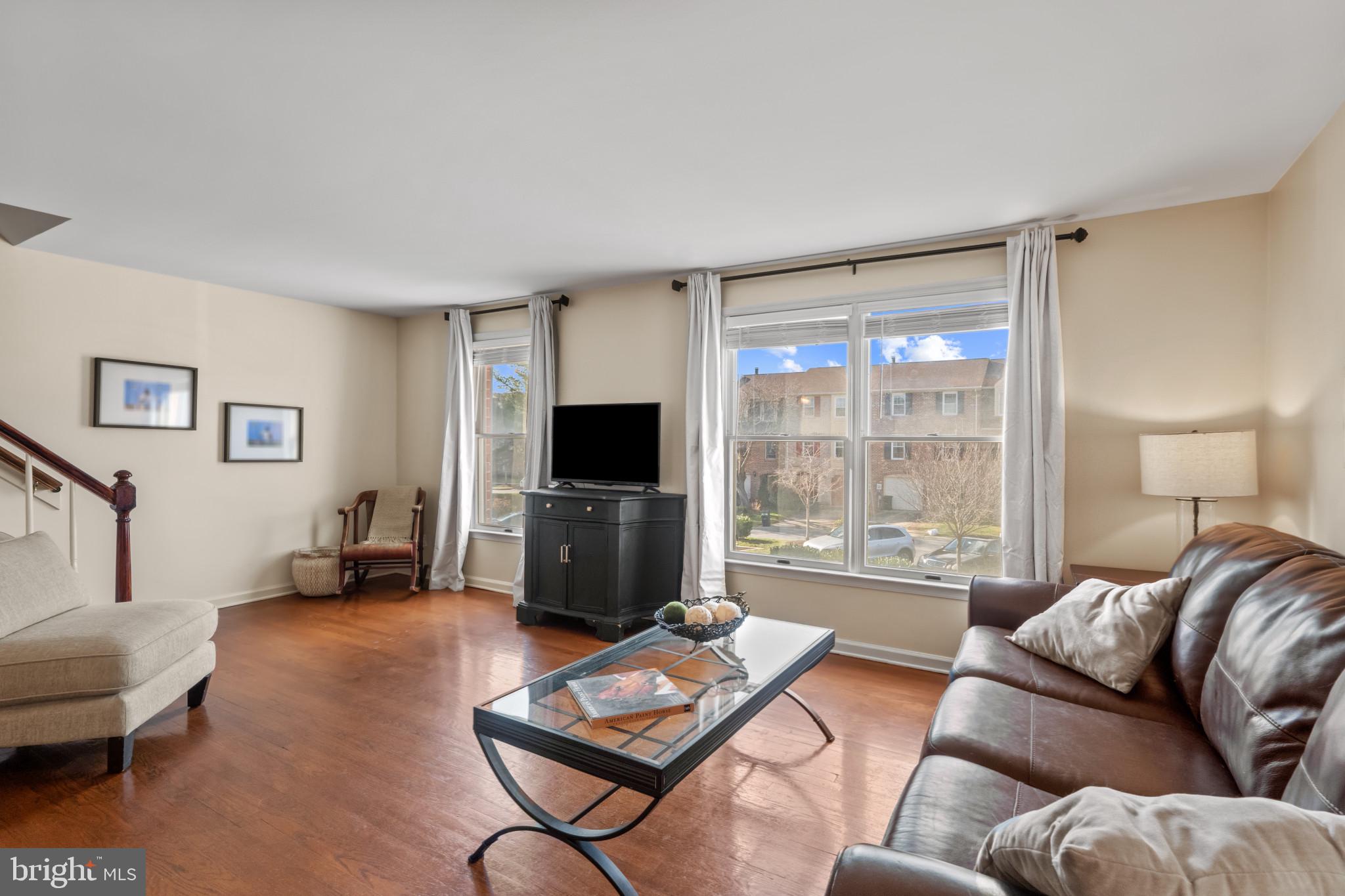 8024 Hollow Reed Court Frederick, MD 21701 - Photo 11 of 25 a living room with furniture and a flat screen tv