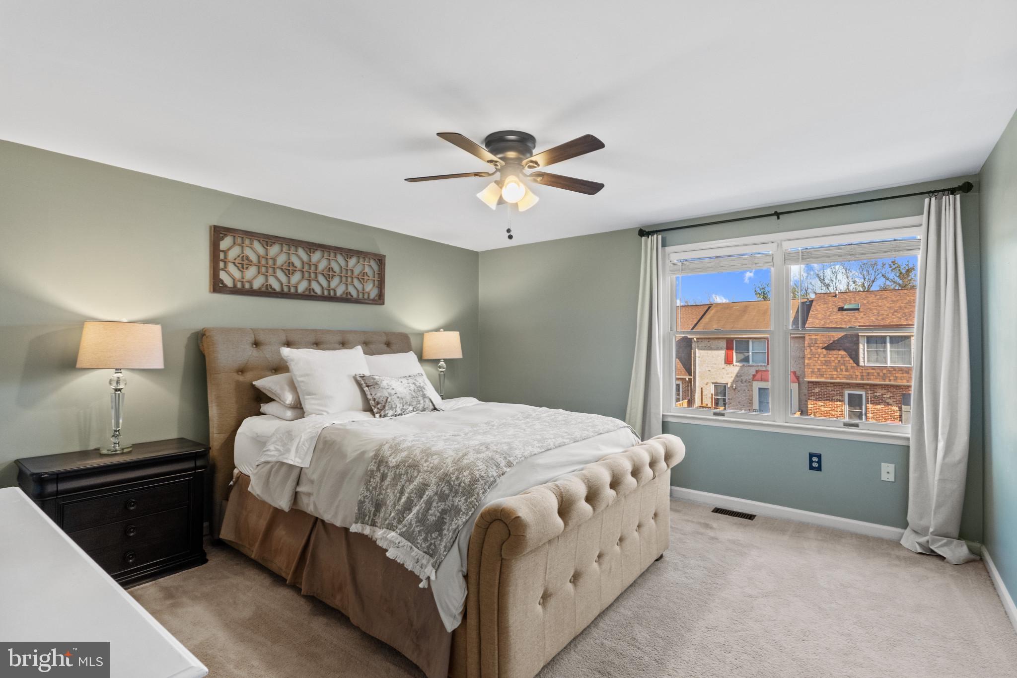 8024 Hollow Reed Court Frederick, MD 21701 - Photo 15 of 25 a bedroom with a bed and a window