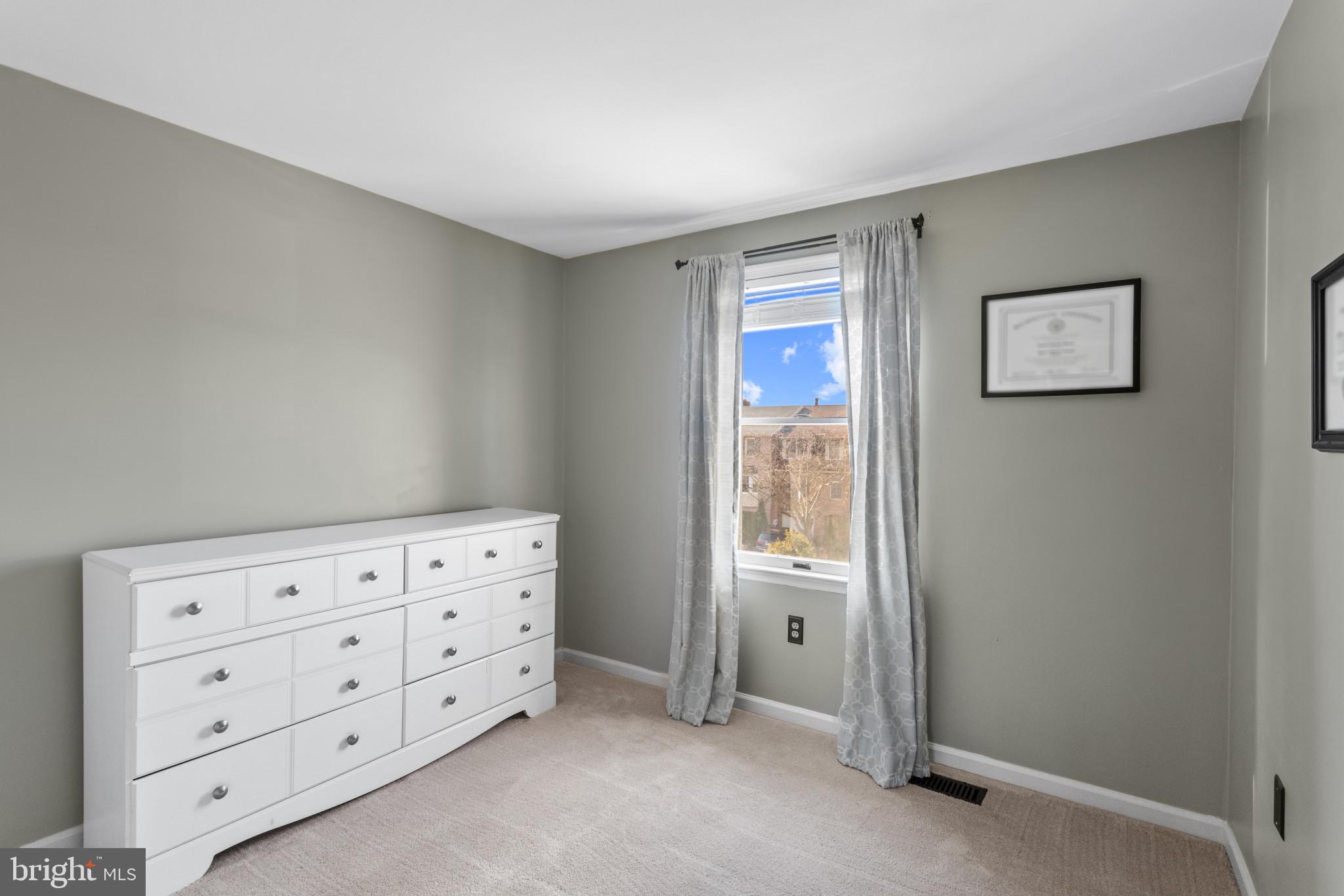 8024 Hollow Reed Court Frederick, MD 21701 - Photo 19 of 25 an empty room with cabinet