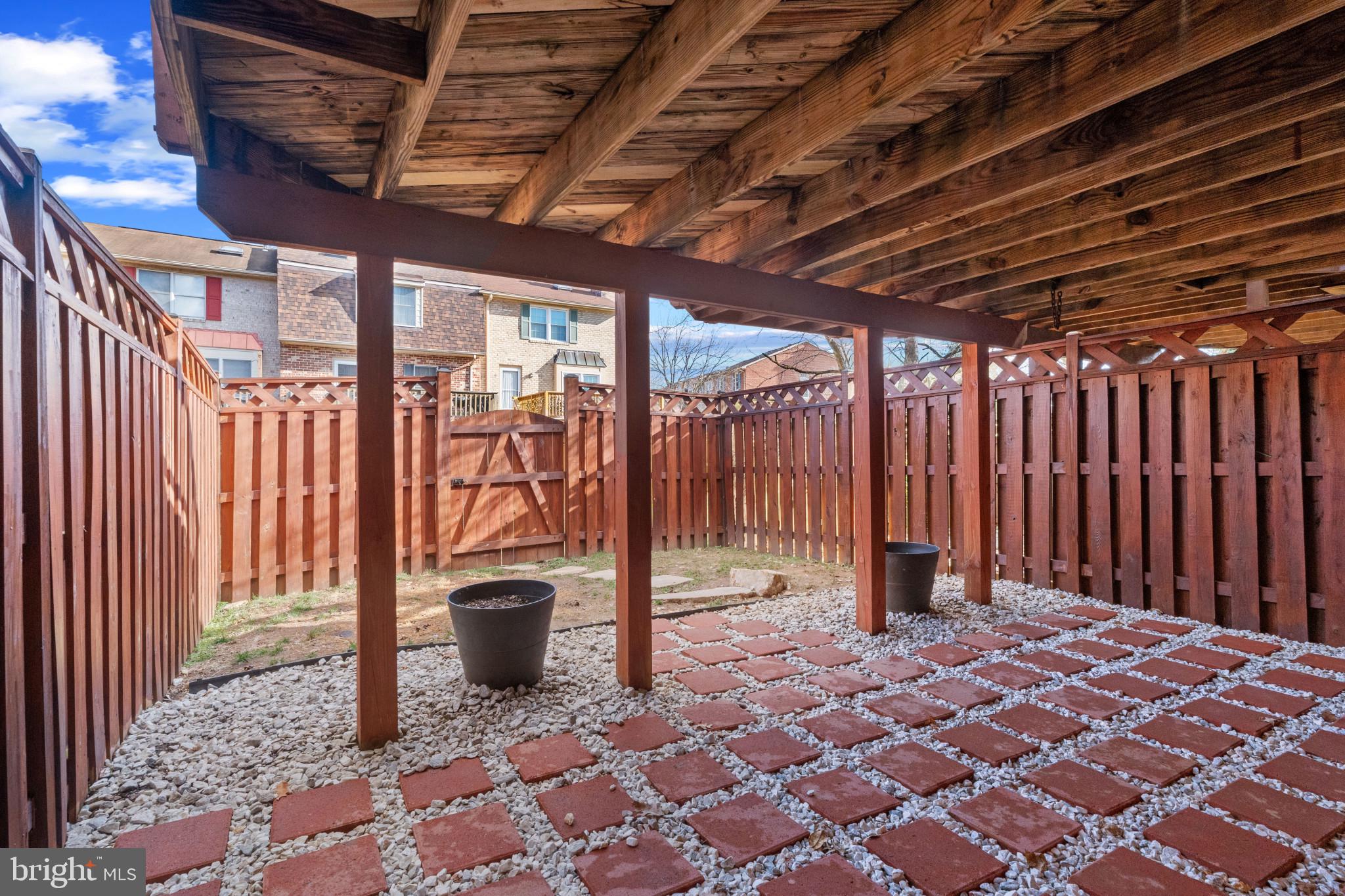 8024 Hollow Reed Court Frederick, MD 21701 - Photo 25 of 25 a view of a porch with a table and chairs
