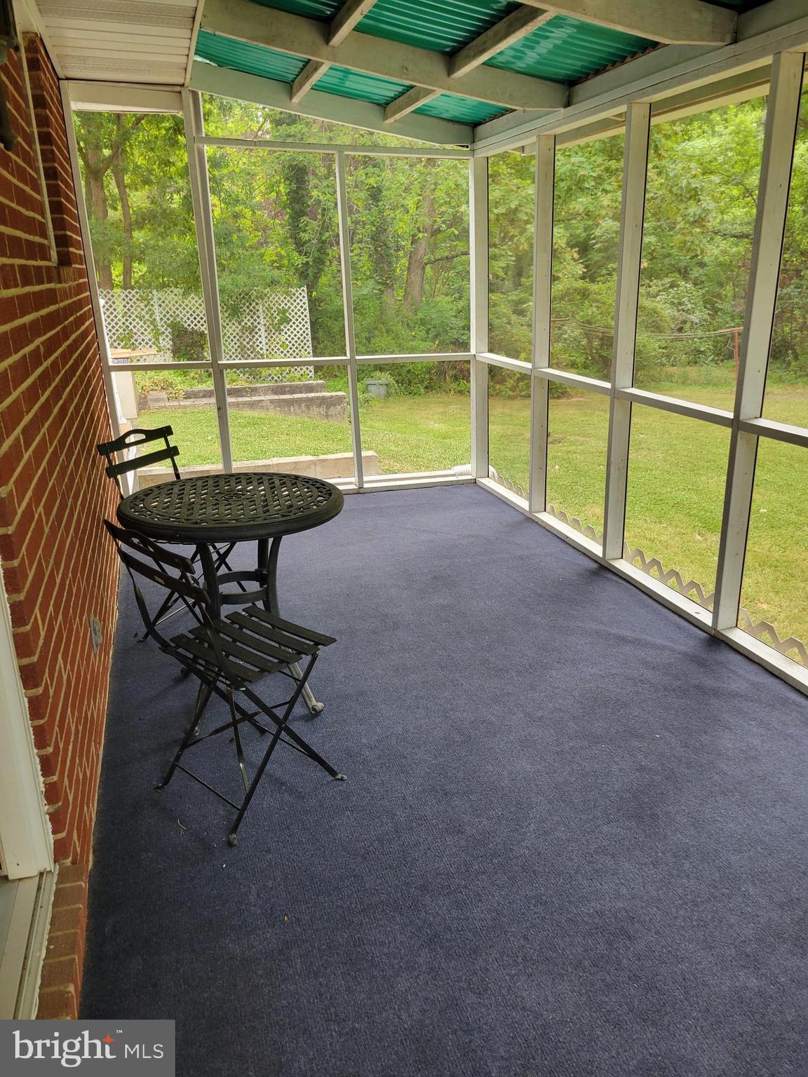 1017 Hanson Road Joppa, MD 21085 - Photo 9 of 14 Screened Porch inside