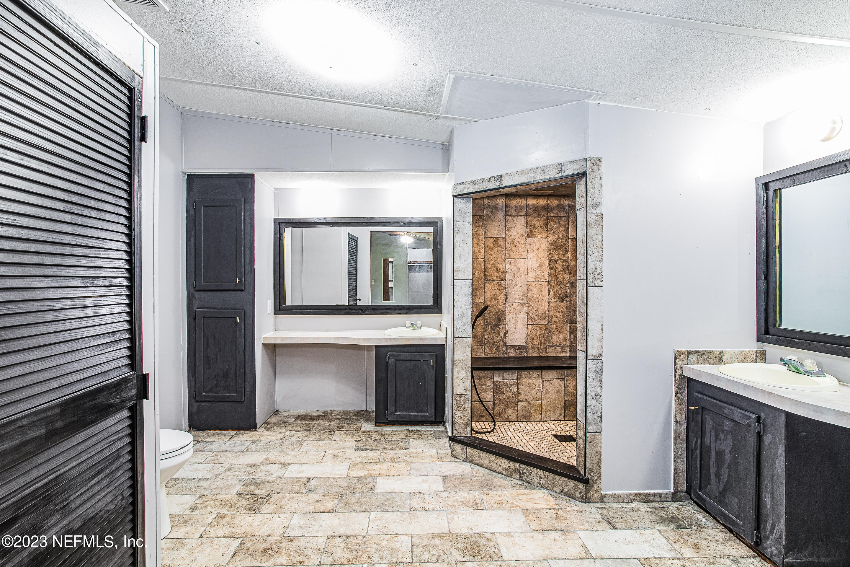 35157 Goodbread Road Callahan, FL 32011 - Photo 23 of 38 a view of a hallway to room with kitchen