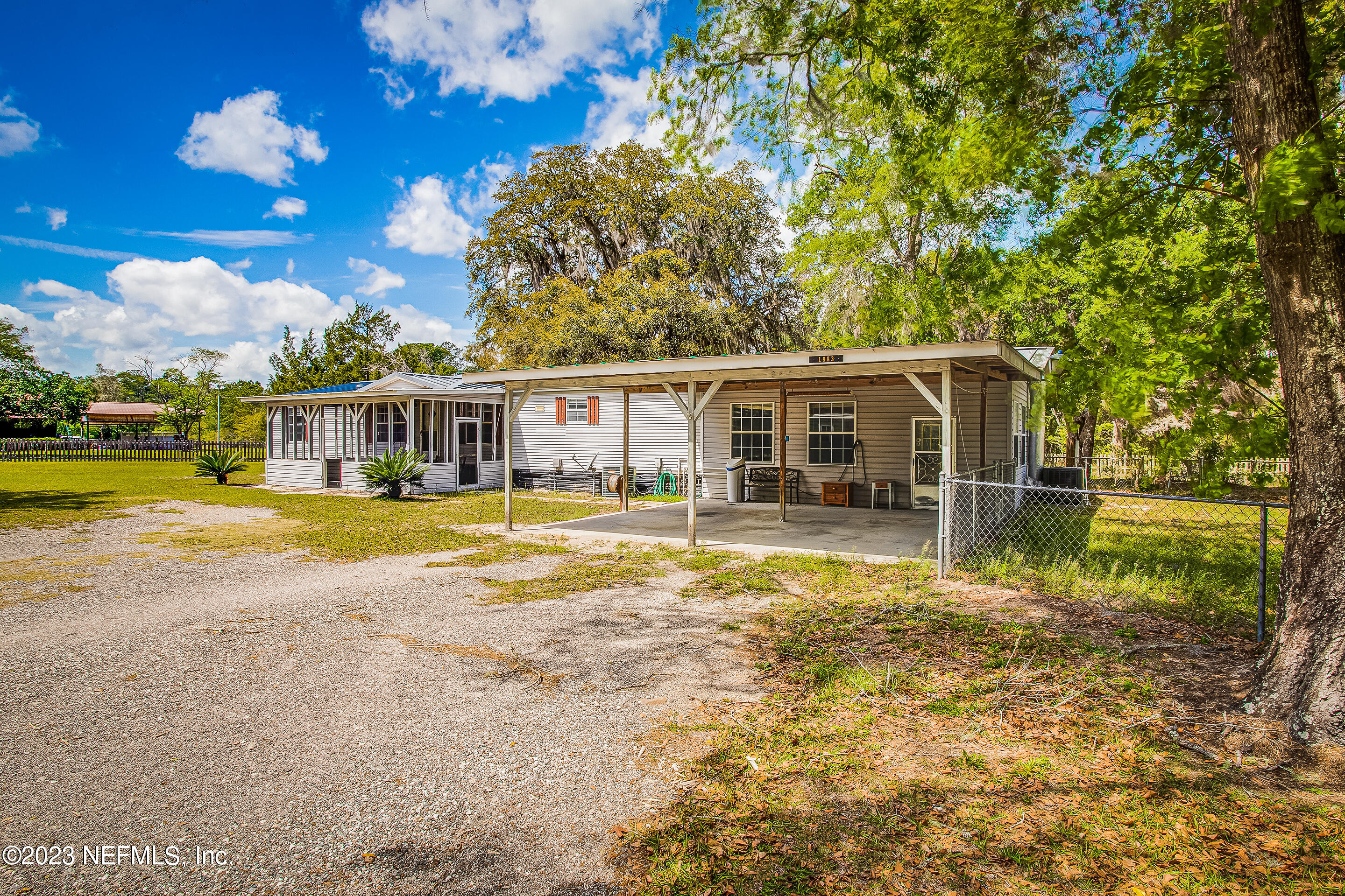 35157 Goodbread Road Callahan, FL 32011 - Photo 3 of 38 a view of a house with a swimming pool
