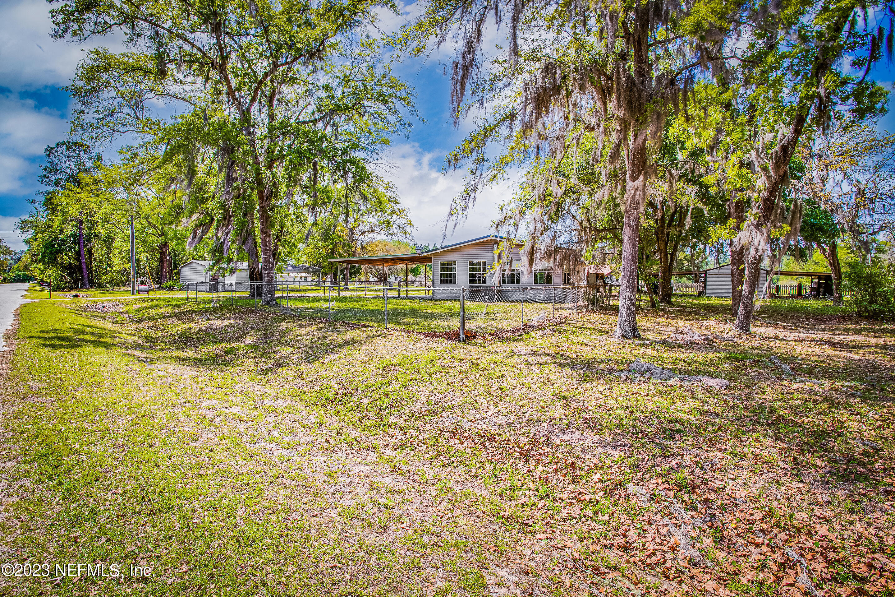 35157 Goodbread Road Callahan, FL 32011 - Photo 37 of 38 a view of a yard with swimming pool