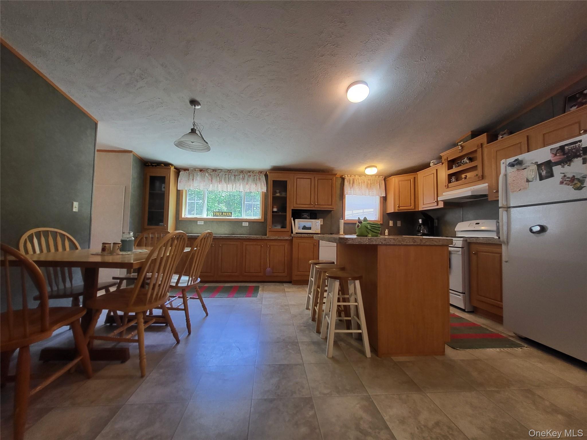 308 William Brown Road Fremont, NY 12741 - Photo 16 of 33 a view of a dining room with furniture and wooden floor