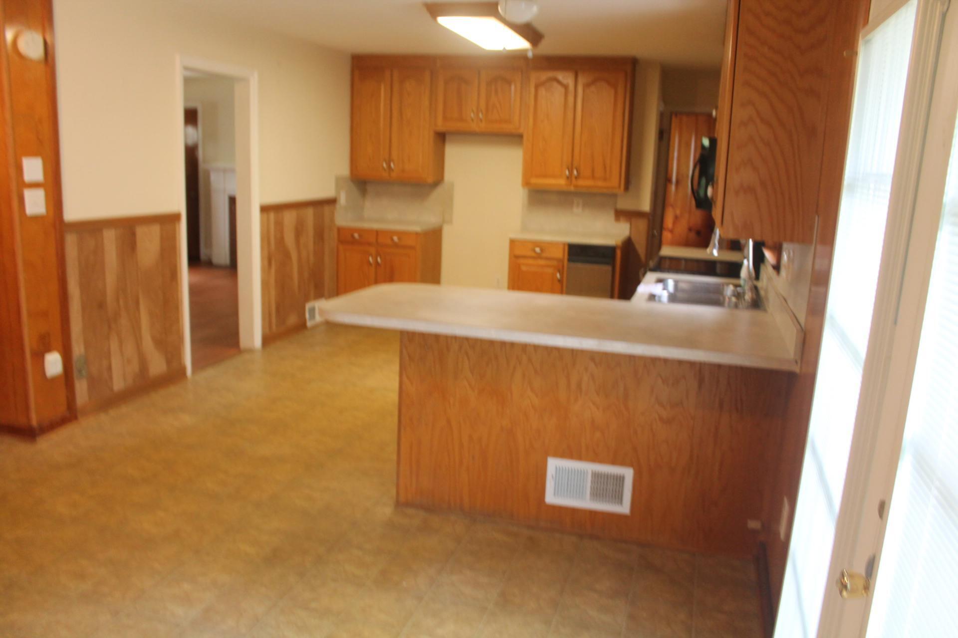 109 Villa Road Ridgeway, VA 24148 - Photo 12 of 32 a room with a door