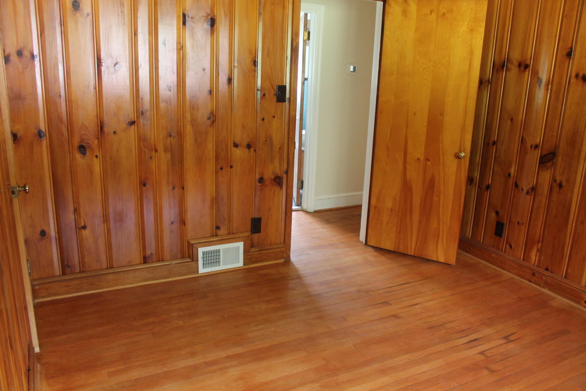 109 Villa Road Ridgeway, VA 24148 - Photo 17 of 32 a view of an empty room with wooden walls