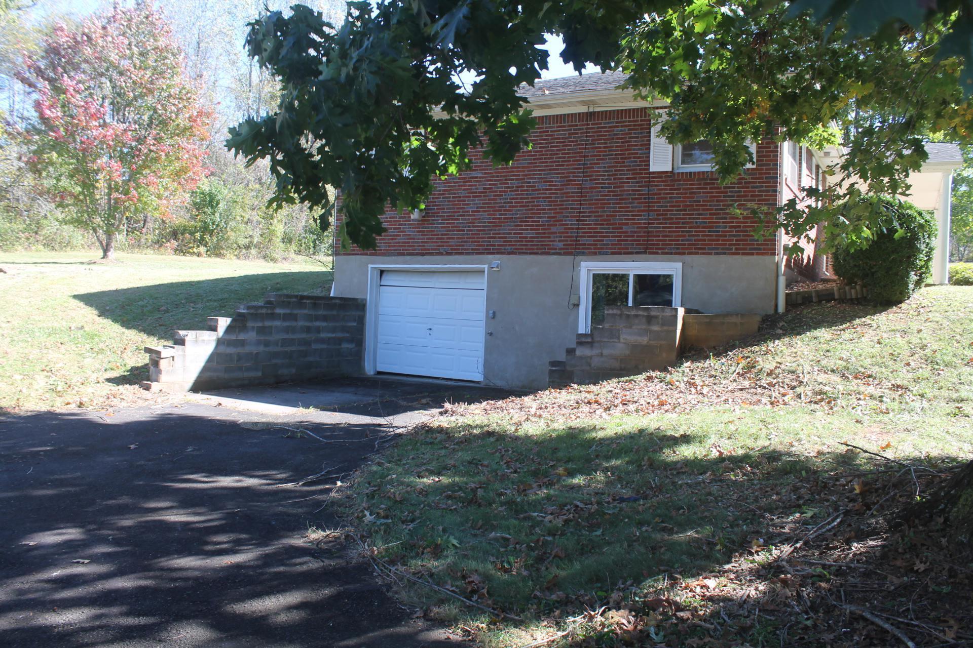 109 Villa Road Ridgeway, VA 24148 - Photo 2 of 32 a front view of house with yard