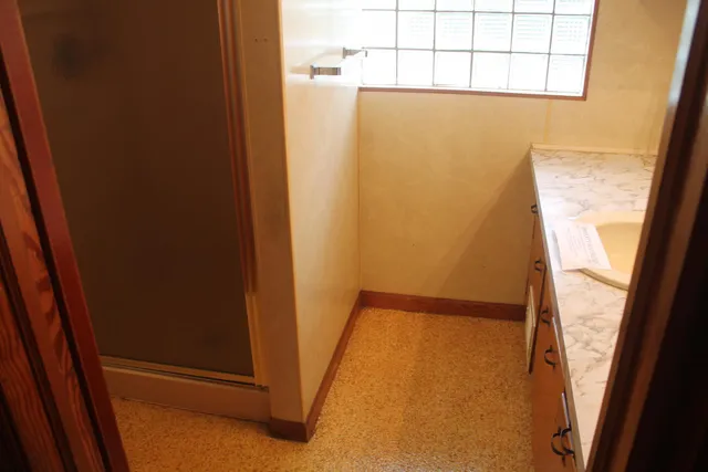 a view of walk in closet with window