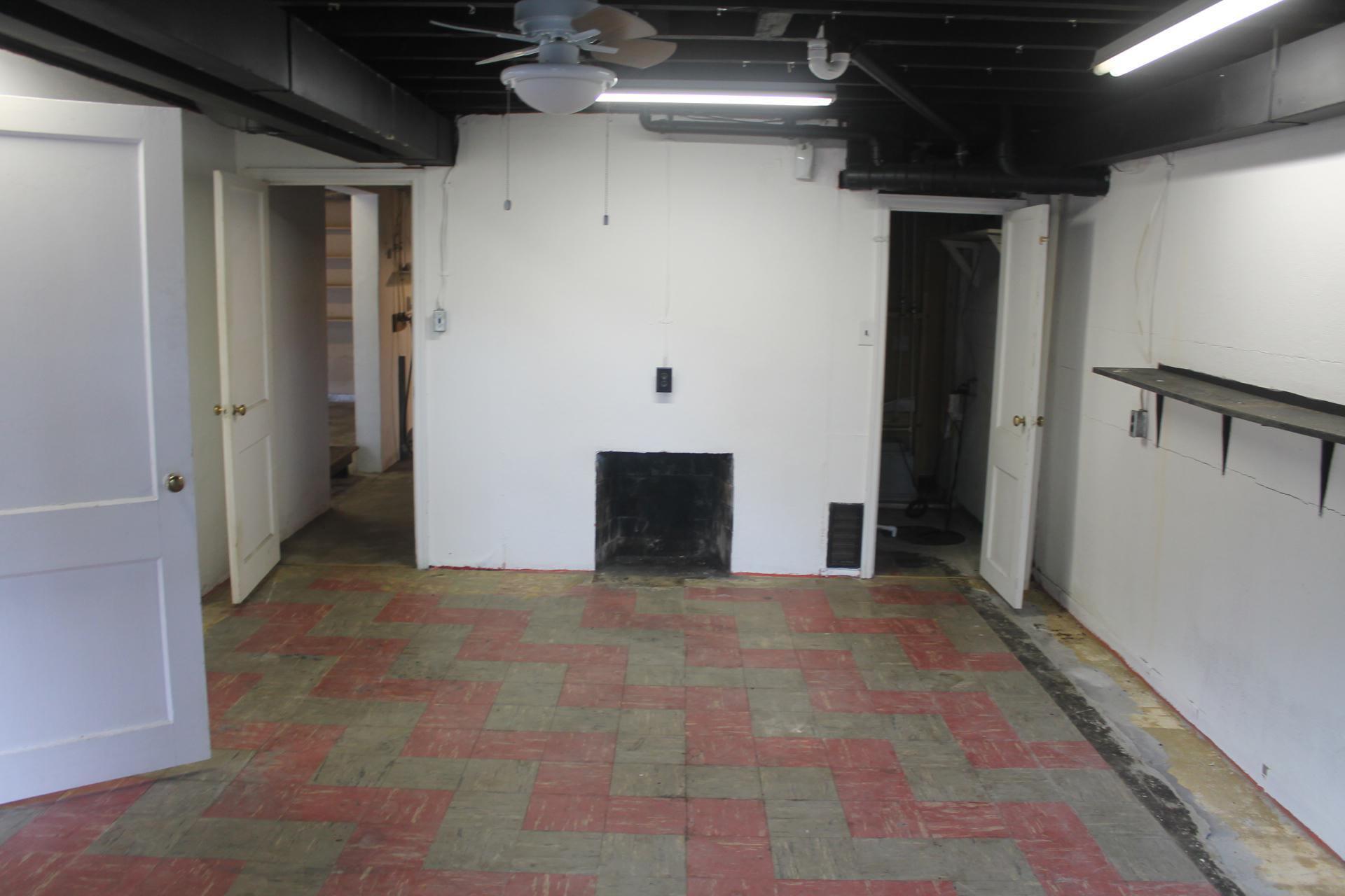 109 Villa Road Ridgeway, VA 24148 - Photo 25 of 32 a view of a hallway with wooden shelves