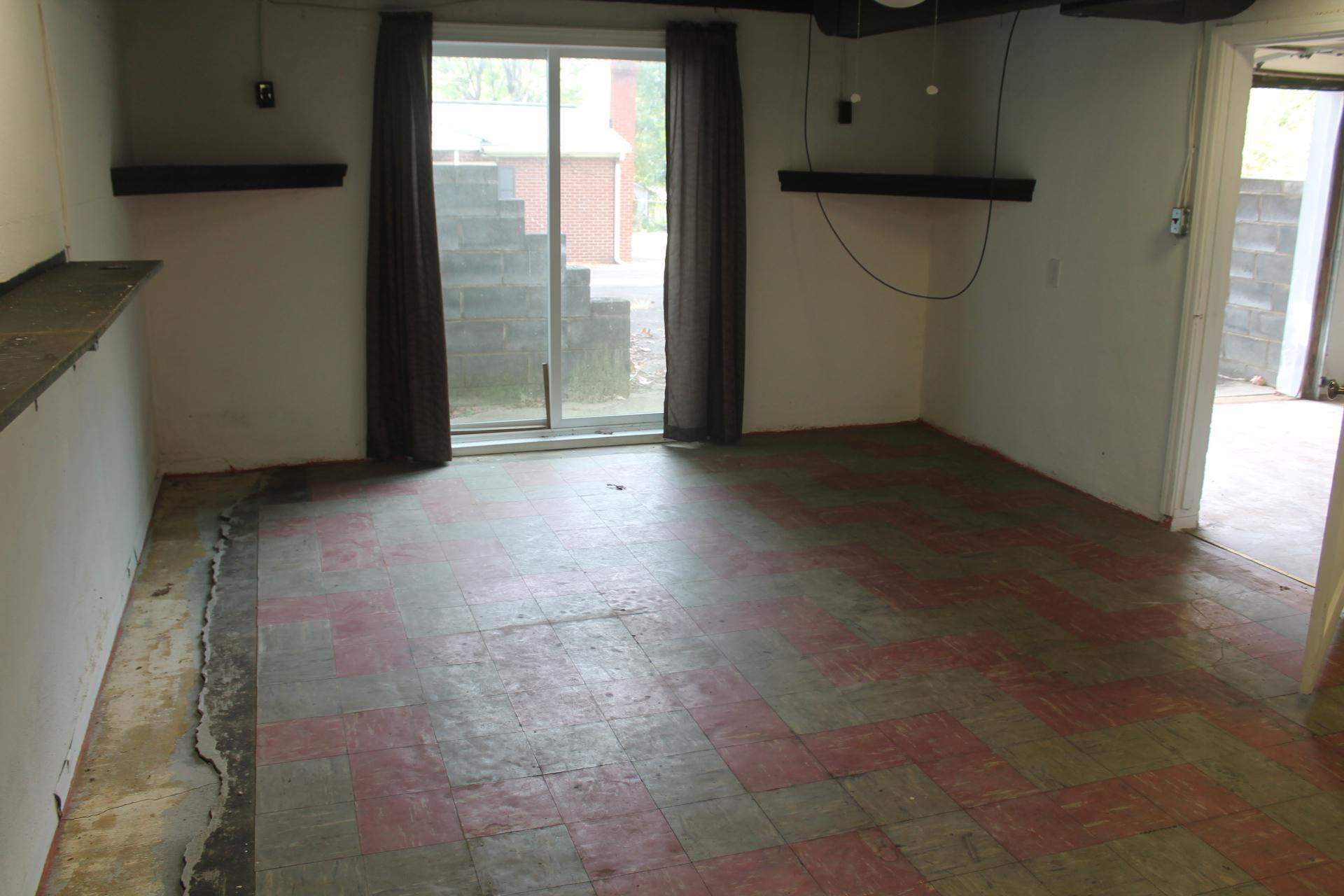109 Villa Road Ridgeway, VA 24148 - Photo 26 of 32 a view of a livingroom with an empty space and a window