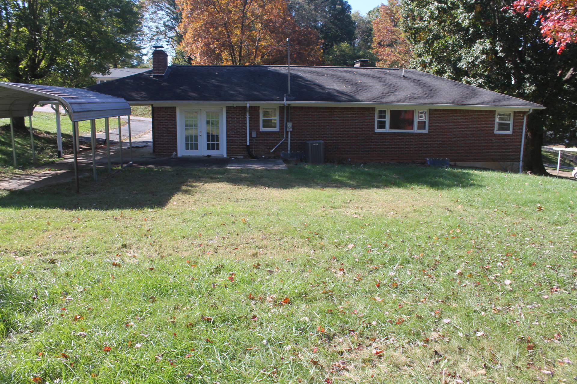 109 Villa Road Ridgeway, VA 24148 - Photo 5 of 32 a backyard of a house